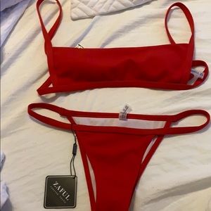 a zaful, unused, red, small both top and bottom.